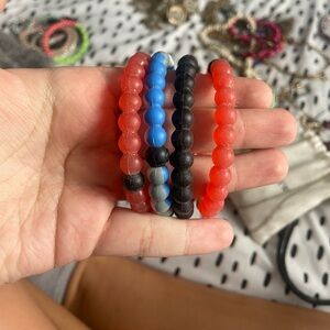 4 Lokai bracelets